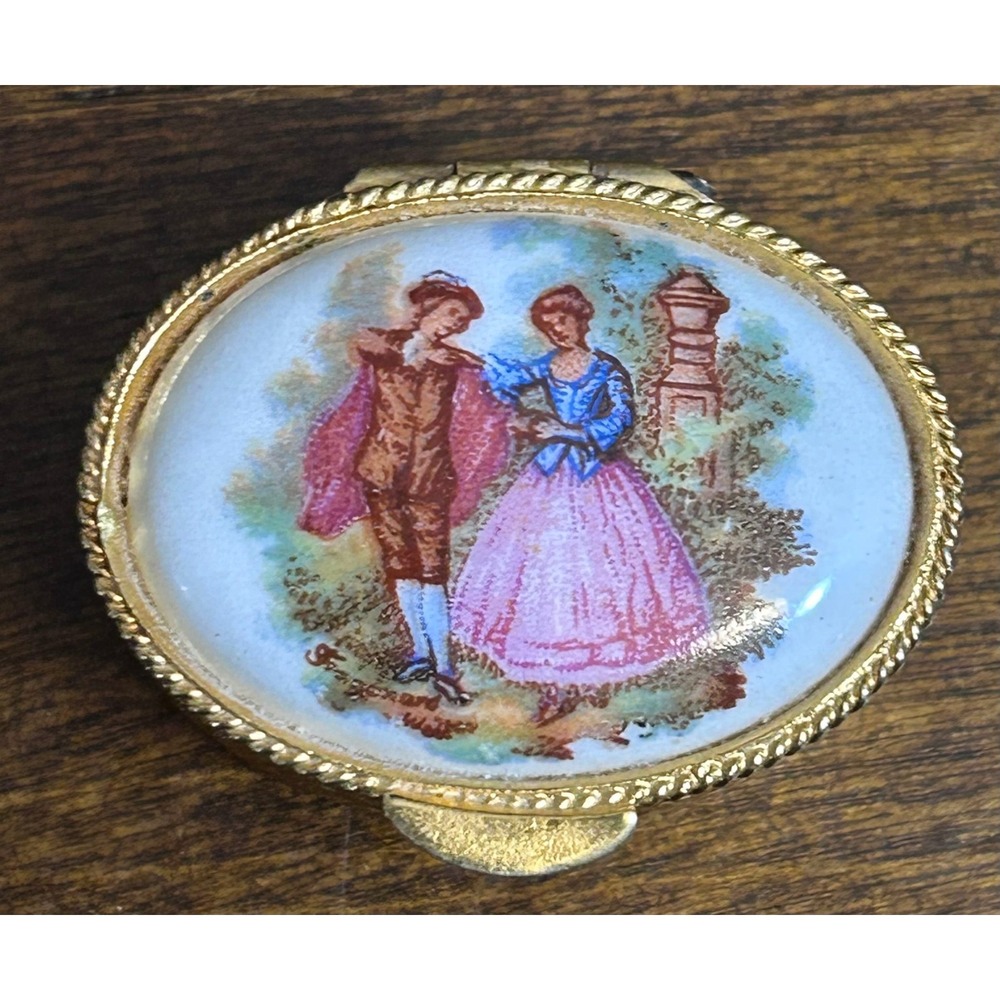 Small Victorian Style Pill Box - Gold Colored with Painted Scene Unmarked 1 3/8"
